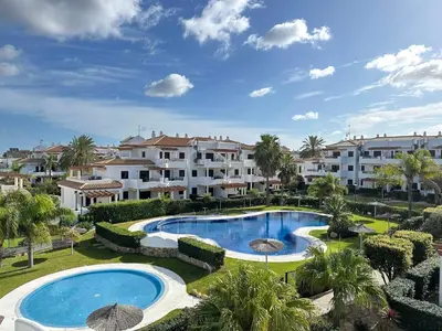 a view of a swimming pool at a resort at Coto de Sancti Petri in Chiclana de la Frontera
