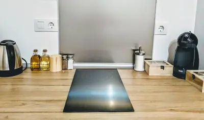 a room with a yoga mat on a wooden floor at Los Patios de la Caleta in Cádiz