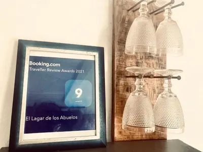 a picture of a picture of a framed picture of a lamp at El Lagar de los Abuelos in Arcos de la Frontera