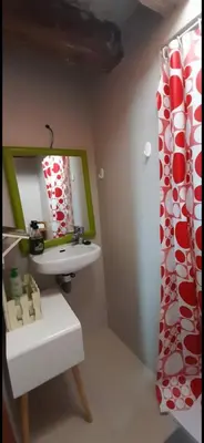 a bathroom with a sink and a mirror at Cathedral two bedroom unit & two balconies in Cádiz