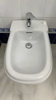 a white sink with a faucet in a bathroom at Castillo del Espiritu Santo (La Jara) in Sanlúcar de Barrameda