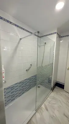 a shower with a glass door in a bathroom at Castillo del Espiritu Santo (La Jara) in Sanlúcar de Barrameda