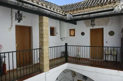 a balcony of a house with a railing at Casa Rural Las Cadenas del Cananeo in Arcos de la Frontera