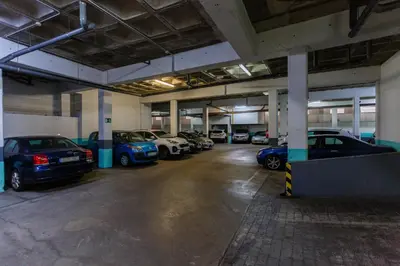 a parking garage with several cars parked in it at Puerta San FELIX free parking by Cadiz4Rentals in Cádiz