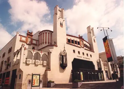 a large white building with a clock tower at Apartamento Centro Sol Plazuela in Jerez de la Frontera
