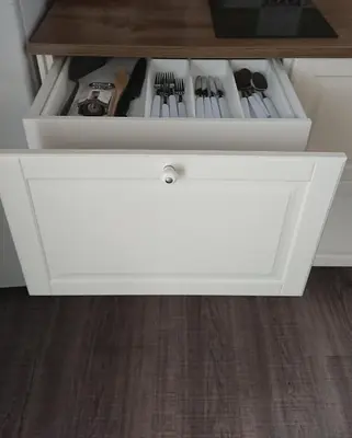 a white drawer in a kitchen with many utensils at La Viña (centro histórico) in Cádiz