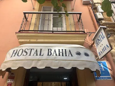 a sign for a hostel ballilla on a building at Hostal Bahía in Cádiz