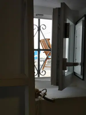 an open door with a view of a stair case at TRIPERIA 25 in Medina Sidonia