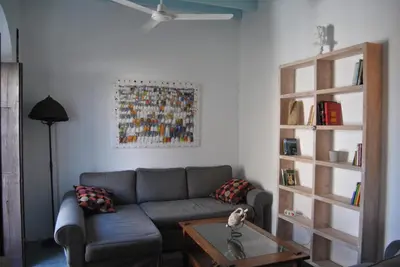 a living room with a couch and a table at Casa-Palacio La Casa Empeño en Centro Histórico in Arcos de la Frontera