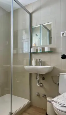 a bathroom with a shower and a sink at BOHEMIA SANLUCAR in Sanlúcar de Barrameda