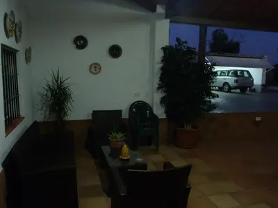 a living room with a car parked in a parking lot at ABULAGAR in Rota