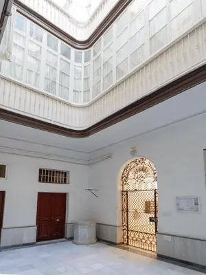an ornate door in a room with a ceiling at Casa Del COLECCIONISTA by Cadiz4Rentals in Cádiz