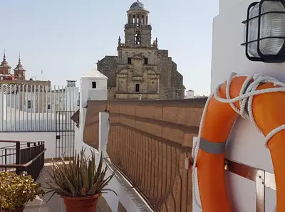 a balcony with a view of a building at APARTAMENTO Centro ciudad in Jerez de la Frontera