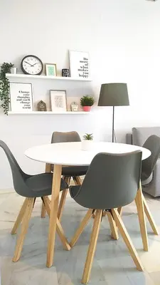 a dining room with a white table and chairs at Sherryflat Los Cisnes in Jerez de la Frontera