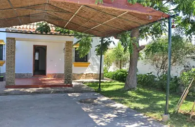 a view of the house from the driveway at Chalet la Dehesa in Conil de la Frontera