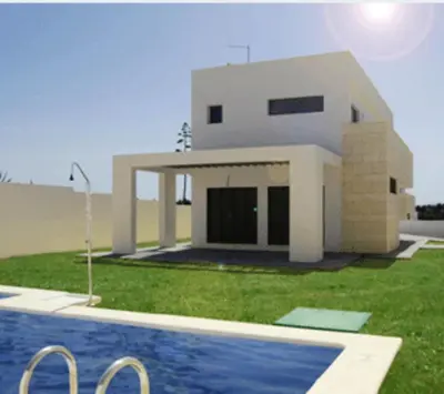 a house with a swimming pool in front of it at Spacious villa in Conil de la Frontera with private pool in Conil de la Frontera