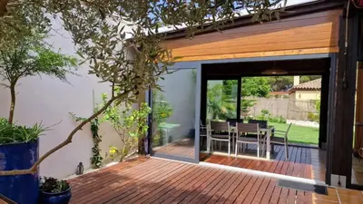 an open door to a patio with a table at Sunny villa with private pool in Chiclana de la Frontera in Chiclana de la Frontera