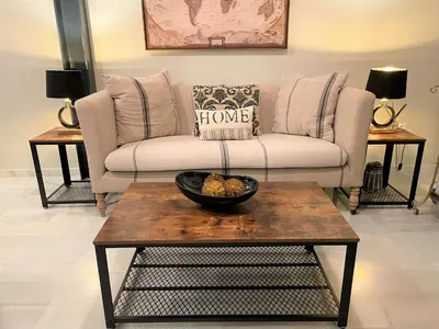 a living room with a couch and a table at No 38 Cádiz in Cádiz