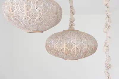 two chandeliers hanging from a chain at Albariza Hotel Boutique in Sanlúcar de Barrameda