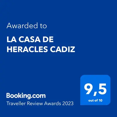 a blue sign with the text awarded to la casa de herzales cable at LA CASA DE HERACLES CADIZ in Cádiz
