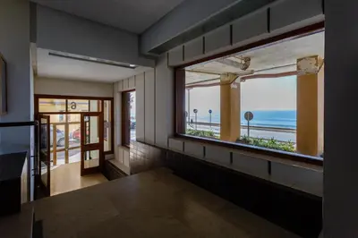a room with a window with a view of the ocean at GAVIOTA Family Home free parking by Cadiz4Rentals in Cádiz