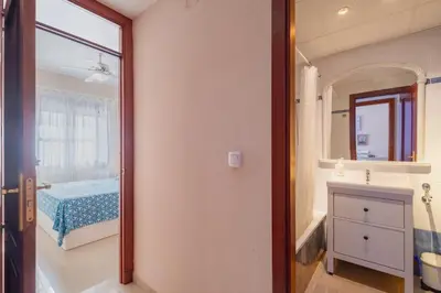 a bathroom with a sink and a mirror at Apartamento Vista Azul in Costa Ballena