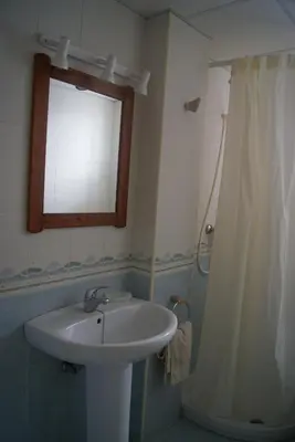 a bathroom with a sink and a shower at Apartamento en Bahia Golf - Costa Ballena in Costa Ballena