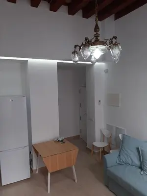a living room with a couch and a table at Apartamentos Valverde Cádiz 1-C in Cádiz