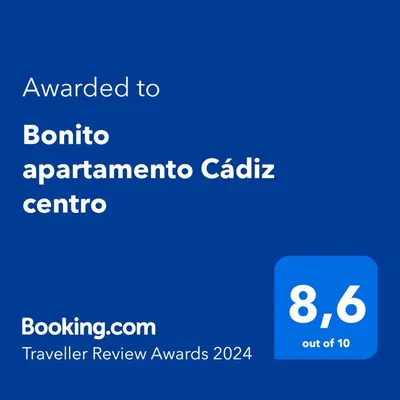 a screenshot of a cell phone with the text awarded to bonric apartment cardiac centre at Bonito apartamento Cádiz centro in Cádiz