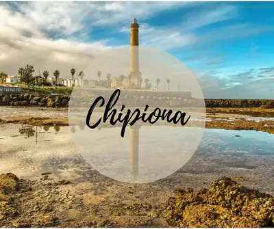 a picture of a lighthouse with the word chicago at APARTAMENTO VIRGEN DEL CARMEN in Chipiona
