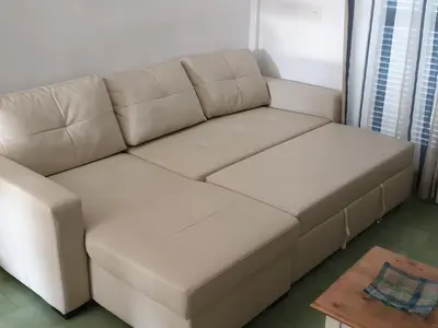 a white couch in a living room with a table at Pinar de Don Jesus Sagitario in Campano