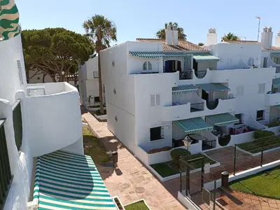 a white building with a staircase next to it at Pinar de Don Jesus Sagitario in Campano