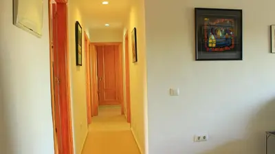 an empty hallway with a hallway at El Anfitrión - Mirador de los Navegantes in Sanlúcar de Barrameda