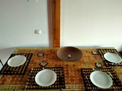 a room with four white plates on the floor at Villa casa blanca luxury spa con piscina privada y jacuzzi privado in Chiclana de la Frontera