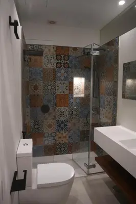 a bathroom with a toilet and a shower and a sink at LOFTS MIRIAM CONDE O,REILLY in Cádiz