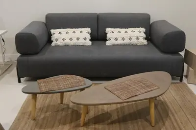 a living room with a couch and two tables at LOFTS MIRIAM CONDE O,REILLY in Cádiz