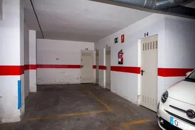 a parking garage with a car parked in it at Sanlucar Misericordia Centro in Sanlúcar de Barrameda