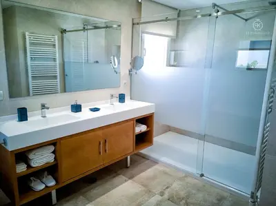a bathroom with a sink and a shower at El Tesorillo II in Arcos de la Frontera