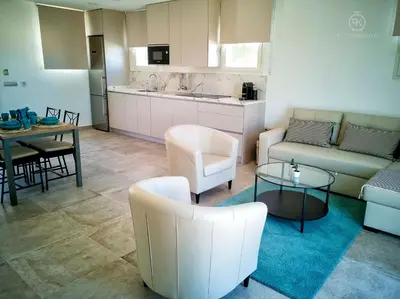 a living room with a couch and a table at El Tesorillo II in Arcos de la Frontera