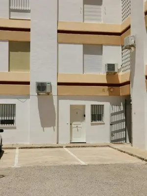 an empty parking lot in front of a building at Apartamento Lapa MRZ Rentals in El Puerto de Santa María