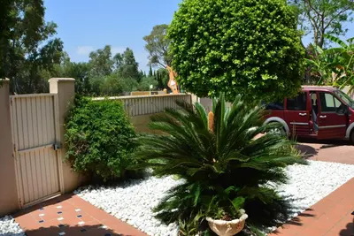 a pool table in the backyard of a house at VILLA FLAMINGO in Chiclana de la Frontera