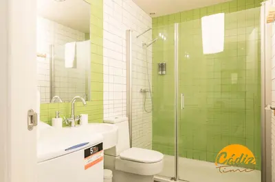 a bathroom with a toilet and a sink and a shower at Corazon del Mar - FREE PARKING by Cadiz Time in Cádiz