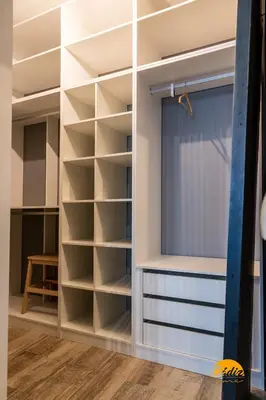 a closet with shelves and a window in a room at La Luz de Cadiz by Cadiz Time in Cádiz