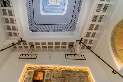 a ceiling with a large screen in a building at Suite Capitán 1 in Cádiz