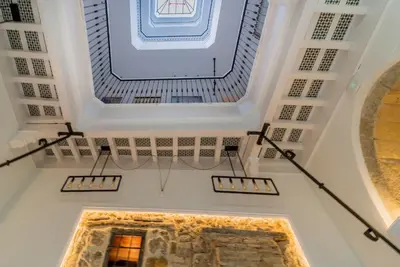 a room with a large screen on the ceiling at Suite Capitán 2 in Cádiz