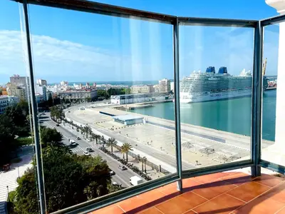 a view of the ocean from a window of a cruise ship at Skyline - Penthouse with 50m2 private terrace and stunning views in Cádiz
