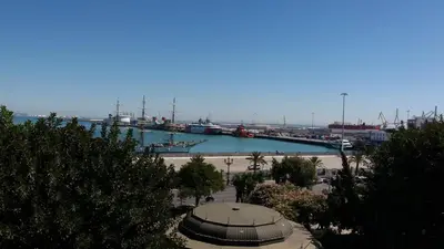 a view of a harbor with boats in the water at Apartamento Puerta al Mar in Cádiz