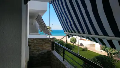 a balcony of a house with a view of the ocean at Junto al Mar in Chiclana de la Frontera
