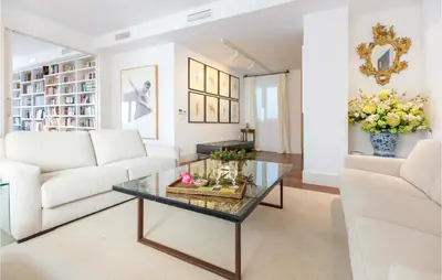 a living room with a couch and a table at Casa Hernán in Cádiz
