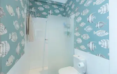 a bathroom with a shower and a toilet in it at Casa Hernán in Cádiz